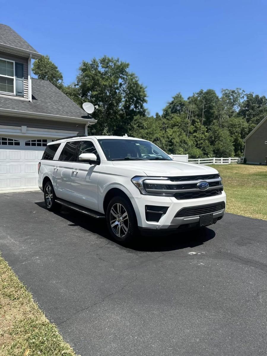 Ford Expedition cleaned up in a customer's driveway